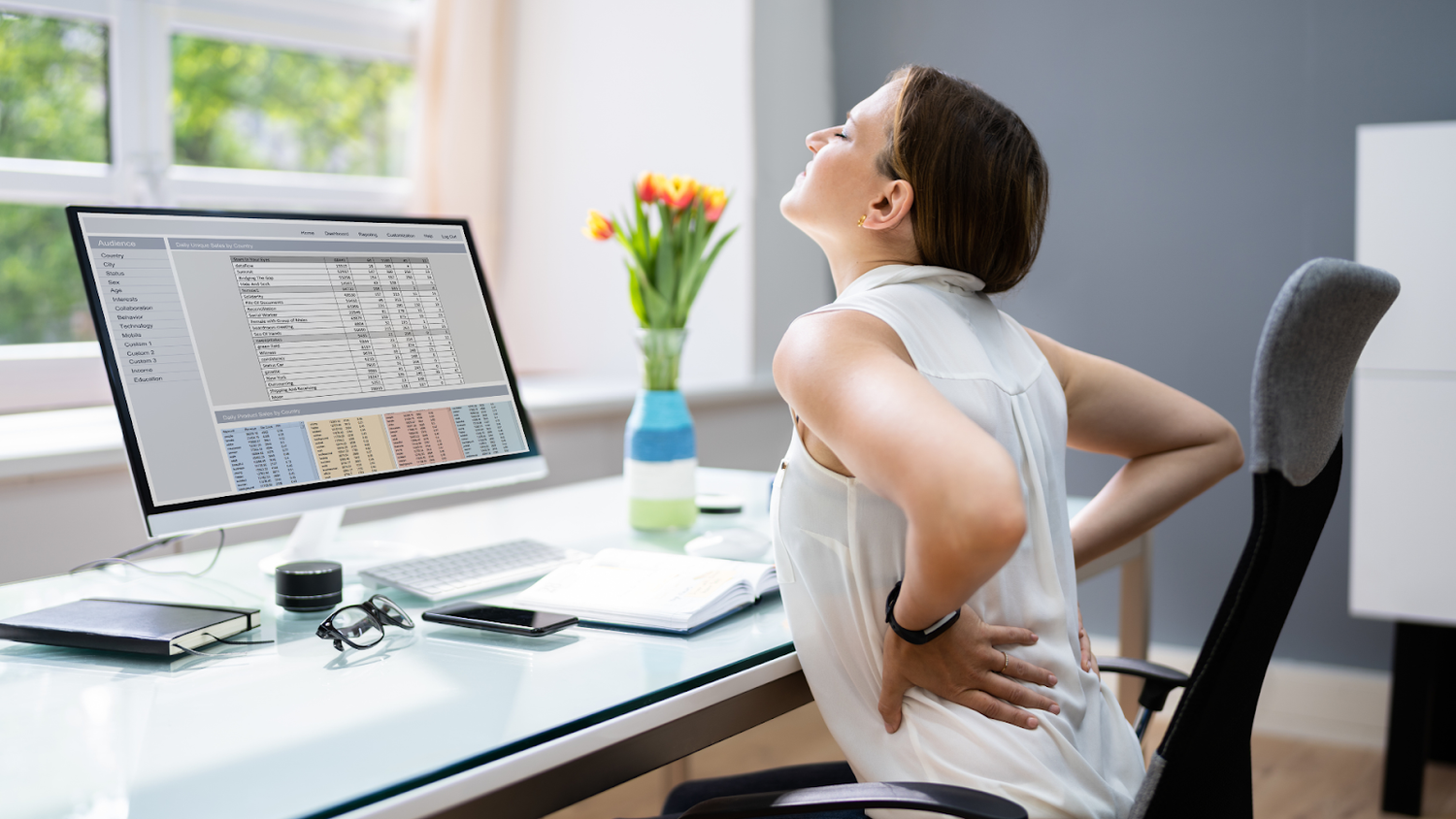 Woman Showing Discomfort From Poor Computer Posture